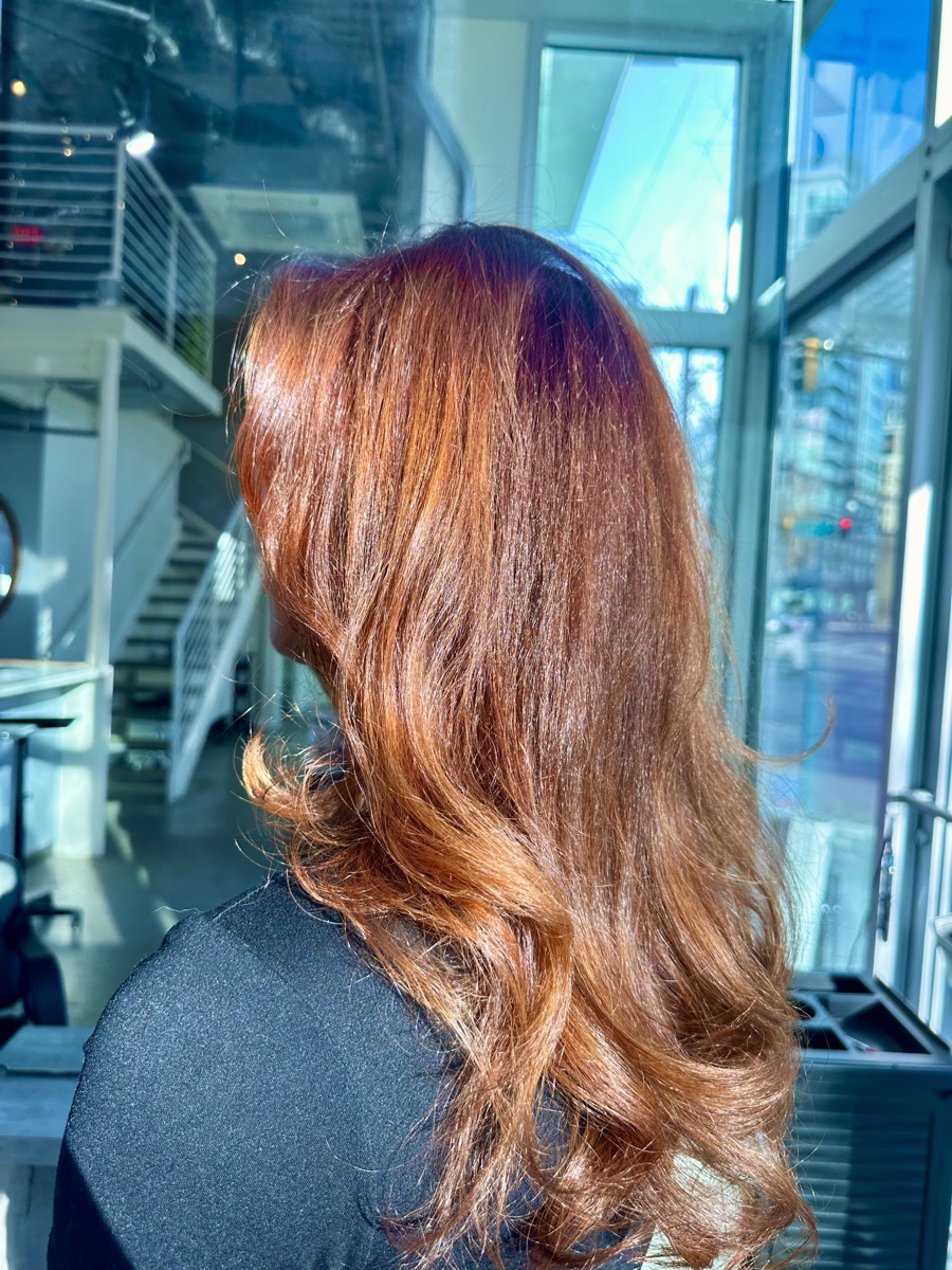 Vivid red color by Hair by Isis