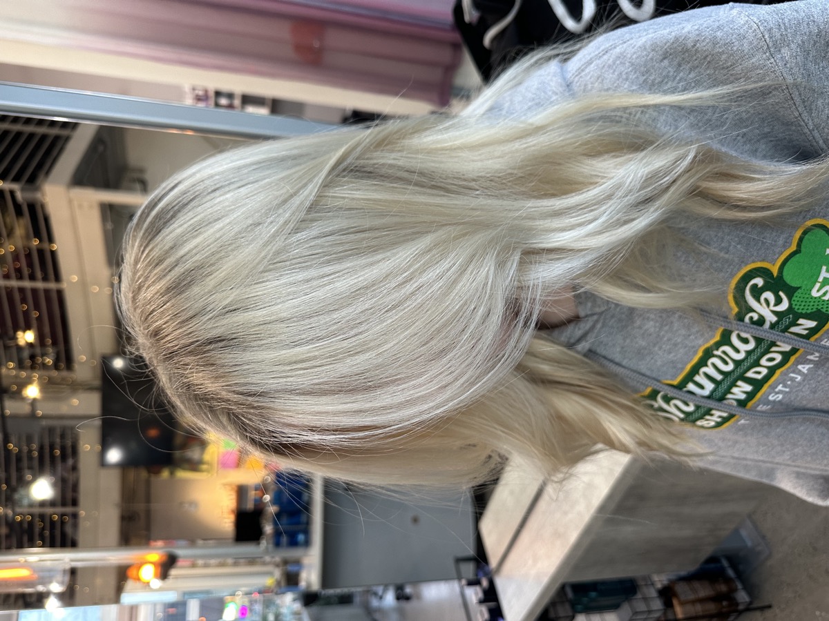 Rich burgundy curled style by Hair by Isis